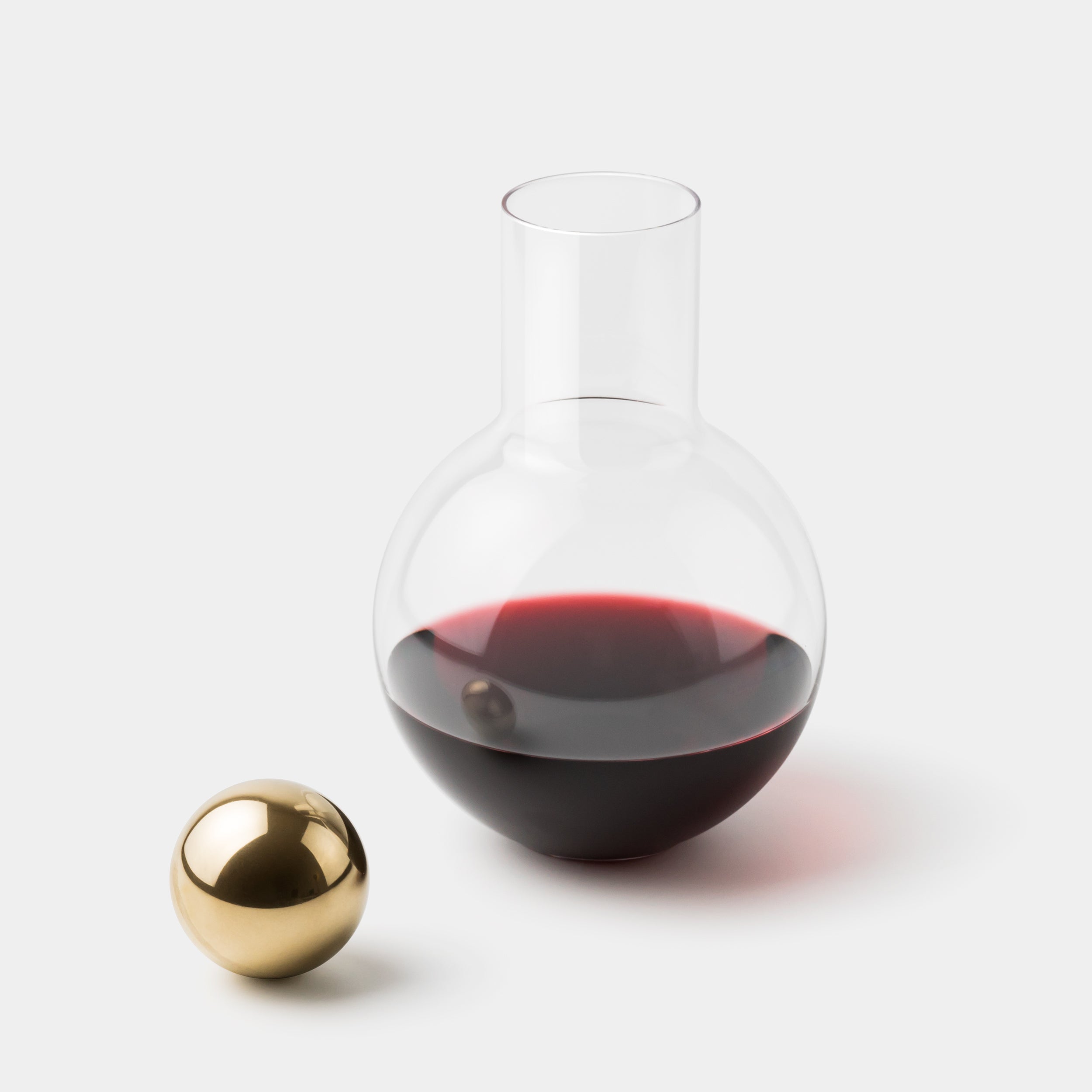 Anna Karlin Decanter brass stopper on the side angle