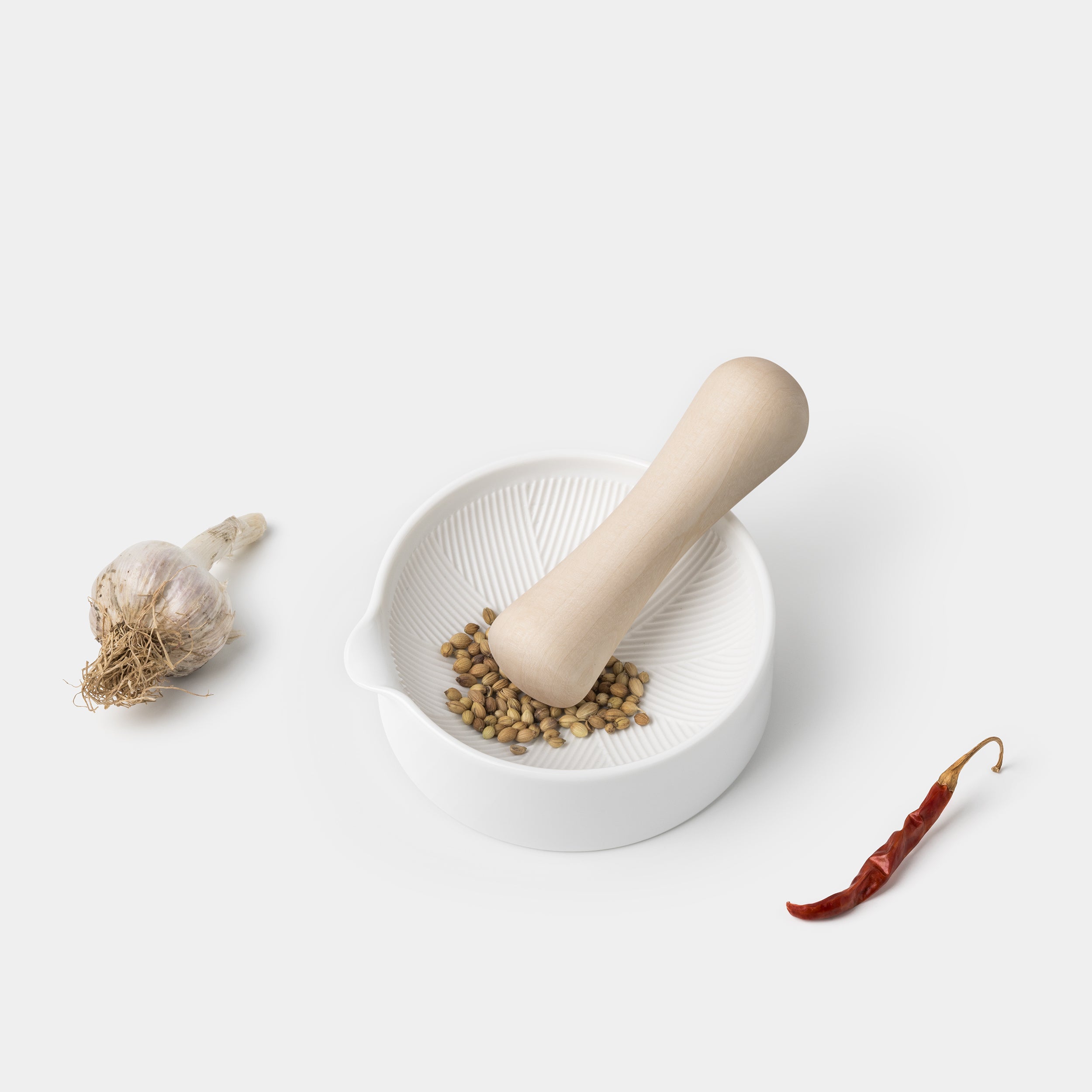 Shitaku Mortar Pestle angle with seeds