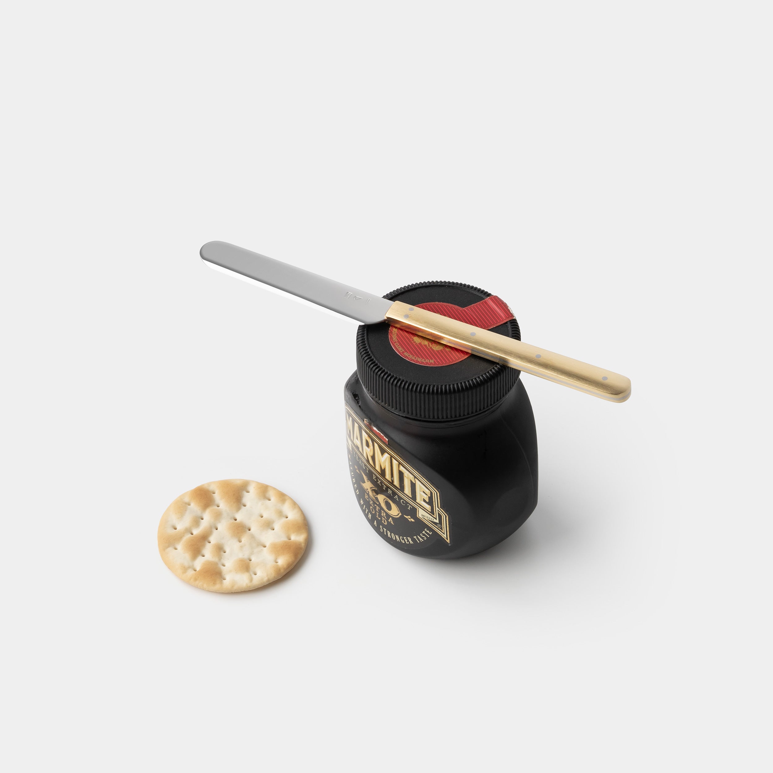 https://www.odetothings.com/cdn/shop/products/azmaya-butter-knife-marmite.jpg?v=1682534694&width=2500