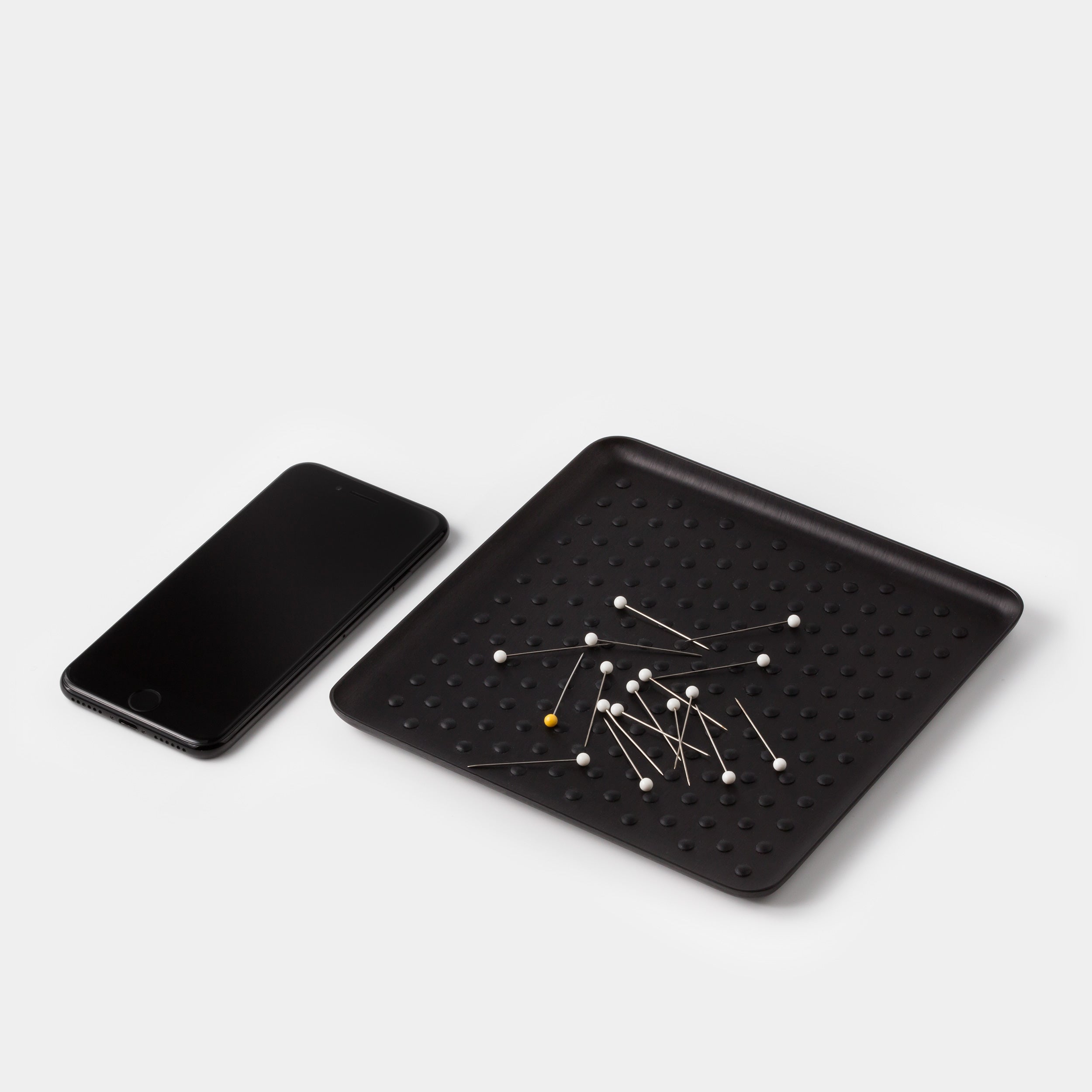 Kaymet Pressed Tray Black Grip with iPhone and pins